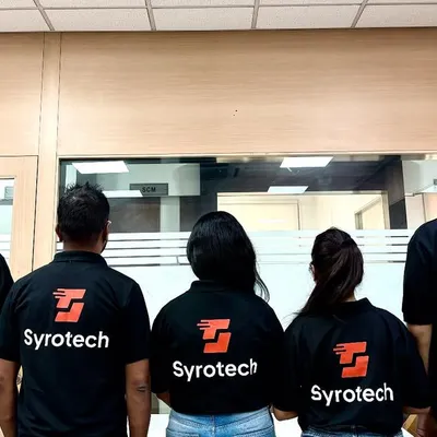 New style, same reliability. Our team sporting t-shirts with our new, dynamic logo.