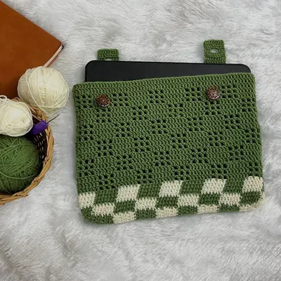 Here is my handmade crochet sleeve with an iPad Pro inside. It's custom-fit to the device, ensuring a snug and protective layer.