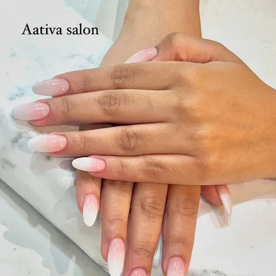 The perfect baby boomer or French ombré nails. We create a seamless gradient from a natural pink base to a soft white tip for a timeless and elegant look.