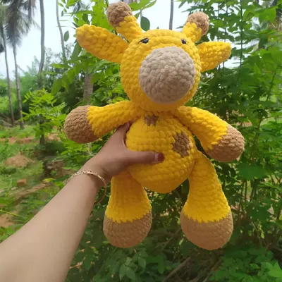 Here is a front view of Gina the Giraffe, the biggest plushie I have made so far at 19 inches tall. She is made with super soft blanket yarn, making her incredibly huggable.