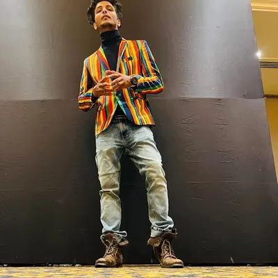 A posed shot from an event. I believe your style is an extension of your personality, and I love to bring that energy to my look.