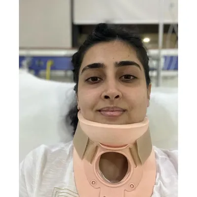 The journey of recovery often starts at a challenging point. This patient came to us after a significant neck injury that required her to wear a cervical collar. This was the beginning of her path back to full strength.