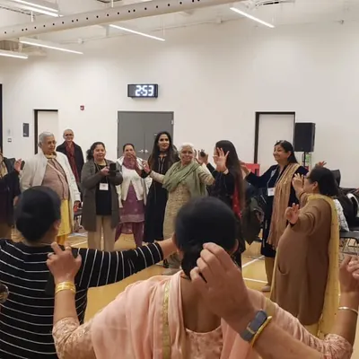 In my sessions with seniors, we often find that joy has no age. Here, we are reconnecting with our inner child, holding hands in a circle of laughter and shared energy. It is a beautiful reminder that community and play are essential at every stage of life.