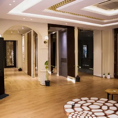 A wide view of my new showroom in Ghitorni, Delhi. It's a one-stop destination for architects and homeowners, showcasing everything from designer doors and modular kitchens to texture veneers and flooring.