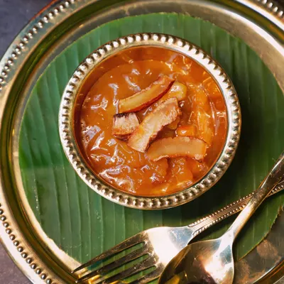 A perfect bowl of Ada Pradhaman. Rice ada, slow-cooked in jaggery and coconut milk, and garnished with fried coconut flakes. This is the taste of pure, unadulterated tradition.