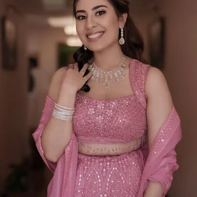 Divya looking stunning for her Sangeet ceremony in this beautiful pink lehenga. We created a soft, romantic makeup look with glowing skin and a simple hairstyle to let her and her outfit be the stars of the show.