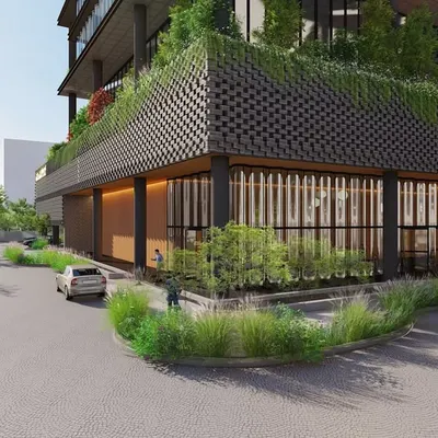The entrance to the MSR Tower is designed to be welcoming, with a landscaped drop-off area and a transparent ground floor that connects the building to the street.