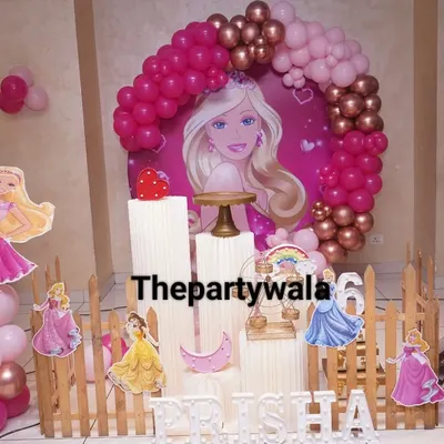 A classic Barbie theme, perfect for a glamorous birthday. This setup includes a large Barbie backdrop, character cutouts, and a pink and rose gold balloon arch.