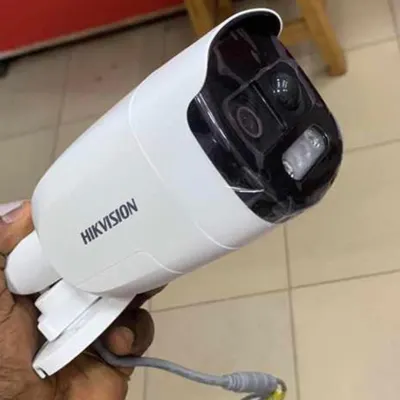 A close-up of a Hikvision bullet camera. This is a powerful and reliable choice for outdoor security.