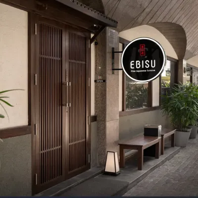 Welcome to Ebisu. Our entrance is designed to be the start of your journey into an authentic Japanese dining experience, setting a tone of tranquility and tradition from the moment you arrive.