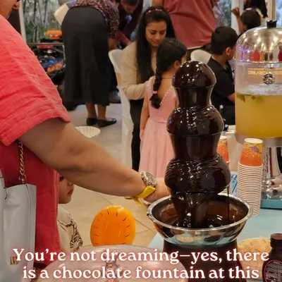 A chocolate fountain is always a showstopper, especially at a birthday bash. Guests of all ages love dipping marshmallows, fruits, and wafers into the flowing chocolate.