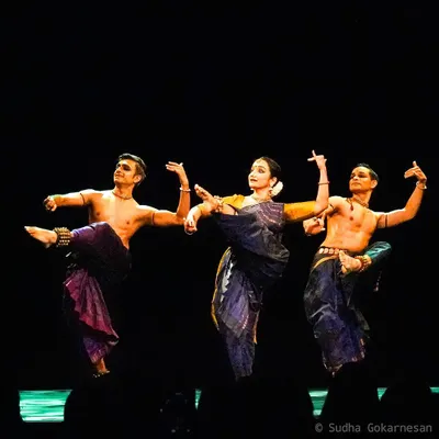 A powerful pose from 'ĀBHA', where the three of us come together to tell the story. The symmetry in our movements is key to conveying the unity and emotion of the narrative.