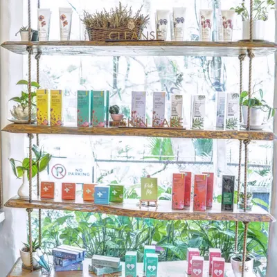 Our retail shelves are a sanctuary of natural skincare. We offer a wide range of aromatherapy-inspired products, from cleansers to serums, all beautifully displayed for you to explore.