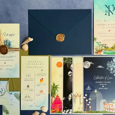 The complete wedding stationery suite for NP's beach wedding. This image showcases the main invite, a detailed wedding itinerary with charming icons, and separate illustrated cards for each function, ensuring a cohesive experience for guests.