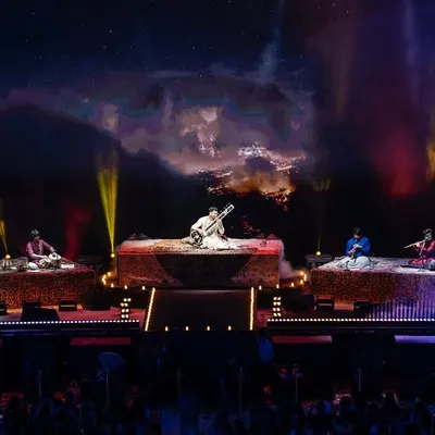 The full stage view of my sold-out show at the biggest indoor stadium in Delhi. My ensemble and I can command any stage, delivering a full-scale production with dynamic lighting and visuals for festivals and ticketed events.