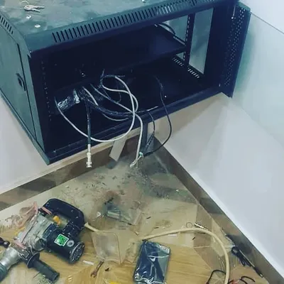 This is a look at the start of a DVR rack installation. I handle all the drilling and mounting myself to create a secure, centralized hub for your entire surveillance system.