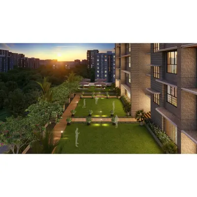 A rendering of a podium-level landscaped garden. This space is designed as an urban oasis, providing residents with a green lawn and tranquil seating areas for relaxation and community gatherings, set against a sunset city view.