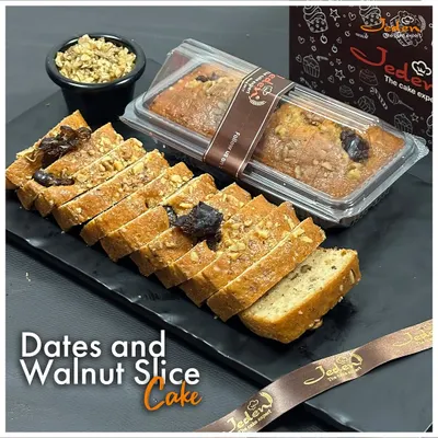 Indulge in the wholesome goodness of our Dates and Walnut Slice Cake. Perfectly moist and packed with the natural sweetness of dates and the crunch of walnuts, this cake is a delightful treat for any time of day.