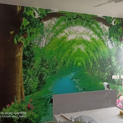 A stunning custom mural depicting a lush green bamboo tunnel over a stream, creating a sense of depth and tranquility in this bedroom.