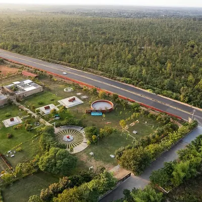 An aerial view of the H.N. Science Center in Gauribidanur, a project I designed for the community. The campus was built using earth excavated from on-site ponds to create the rammed earth walls, fully integrating the architecture with its landscape.