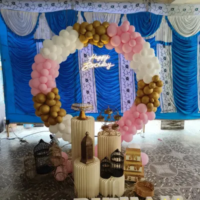 This 'Happy Birthday' decoration showcases the versatility of my services. Using the same popular elements like a circular balloon arch, a custom neon sign, and marquee letters, I can create a festive and personalized atmosphere for birthdays and other milestone celebrations.
