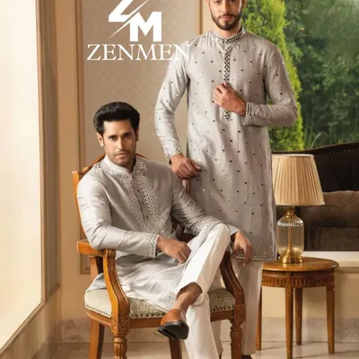 A showcase of my finely detailed grey kurta sets. The one on the left features heavy mirror work on the placket, while the one on the right has a more scattered, subtle pattern.