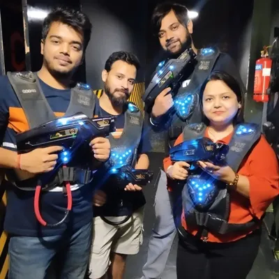 This squad came ready to play. Geared up in our laser tag vests, they're about to enter the arena for some friendly competition.