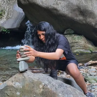 In Bir, I learned that focus is key, whether you're paragliding or stacking stones. This act of creating a cairn is a form of active meditation, connecting me to the present moment and the natural world.
