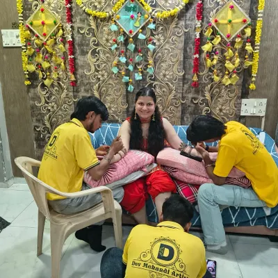 This is how we work. My team of artists can handle the entire bridal party at once, ensuring everyone gets beautiful mehndi without any delay.