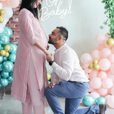 A classic, heartfelt pose during a maternity and baby shower event. I help couples feel comfortable so we can capture beautiful, intimate photos like this one.