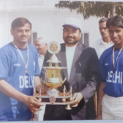 A throwback photo of my Guru ji and our team with a championship trophy. His teachings are the reason for our success today.