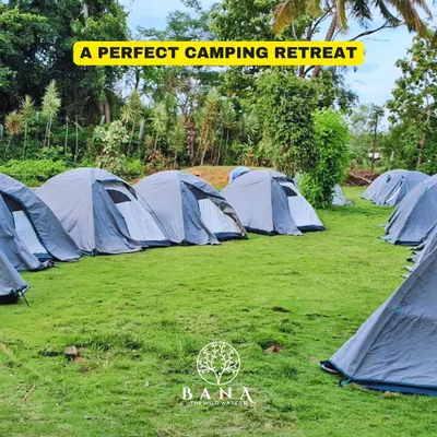 Welcome to your perfect camping retreat. Our well-maintained tents are set up on a lush green lawn, ready for your next adventure near Bangalore.