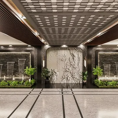 I believe even functional spaces like a stilt parking area can be beautiful. Here, I designed a contemporary residential entrance with integrated waterfalls, greenery, and a sculptural feature wall to create a resort-like arrival experience.
