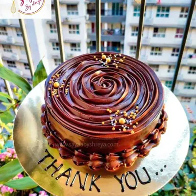 Look at that beautiful swirl and the glossy shine on the chocolate ganache. This is my classic rich chocolate cake, a simple yet decadent treat that says "Thank You" in the sweetest way possible.