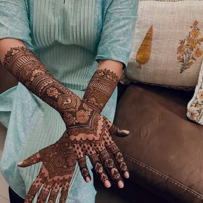 A close-up showcasing the density and detail of a full-arm bridal design. I layered floral, geometric, and traditional motifs to create this rich and textured look.