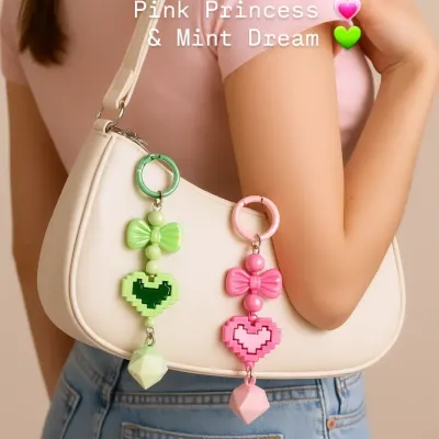 Here are my pixel heart bag charms in action. Available in 'Pink Princess' and 'Mint Dream', these beaded charms add the perfect kawaii touch to any handbag.