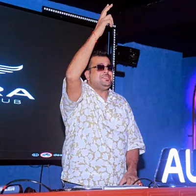 Getting the crowd hyped during a Saturday night set at Aura Night Club. My goal is always to see hands in the air.
