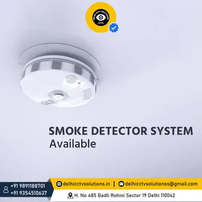 This is a ceiling-mounted smoke detector I install in homes and businesses. Its discreet design provides 24/7 monitoring for smoke, offering an essential layer of fire safety for your property and the people in it.