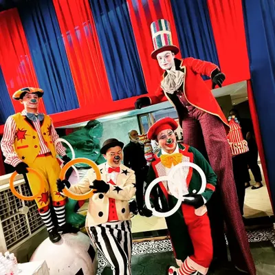 Welcome to the carnival! We brought in entertainers like clowns and stilt walkers to create an authentic and lively atmosphere for this grand birthday celebration. Every detail was planned for maximum fun.