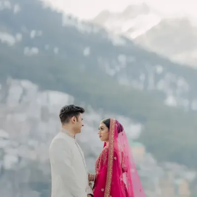 Against the vastness of the Manali mountains, the couple shares a look. This is more than a portrait; it's a story of love as grand as the landscape.