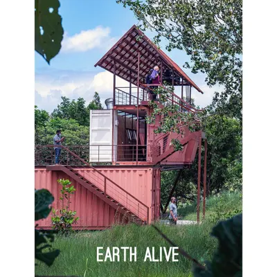 A closer look at the repurposed shipping container tower at our Earth Alive project. This structure demonstrates how industrial materials can be transformed into functional and playful architecture, creating a vertical viewpoint to observe the surrounding rewilded habitat.
