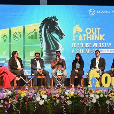 As a moderator, my job is to facilitate a lively and informative discussion. Here, I'm guiding the panel on career opportunities at the Larsen & Toubro 'OutThink 2025' event, ensuring we cover key topics for aspiring professionals.