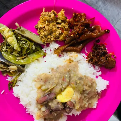 I enjoyed my lunch so much today. A full plate with different vegetable preparations, chutney, and a main curry over rice.