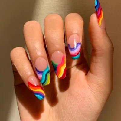 Make a bright and bold statement with this rainbow wave design. This intricate freehand art on a clear base shows my skill in creating clean lines and vibrant color combinations.