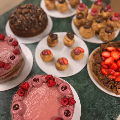 A table full of happiness. This spread for Mother's Day included my raspberry cakes, a strawberry tart, and an assortment of choux pastries. It's my happy place.