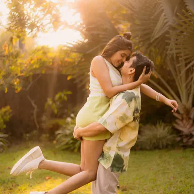 A classic golden hour lift, filled with warmth and affection. The soft backlighting creates a beautiful halo effect, making this romantic couple portrait feel truly magical.