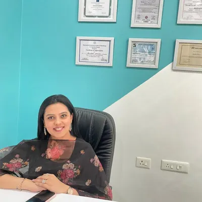 Welcome to my clinic. Behind me are the certifications that represent years of dedication to my field, but my true achievement is helping you get back to a life without pain. My goal is to be your partner in health and recovery.