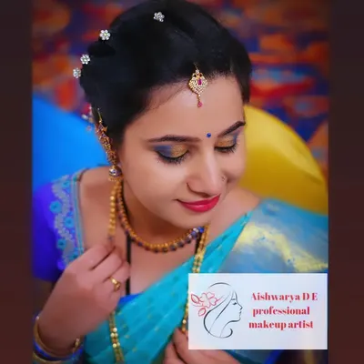 A beautiful, soft glam look perfect for a naming ceremony. I focused on creating a flawless base and highlighting the eyes with a touch of gold and blue to complement her stunning turquoise saree.