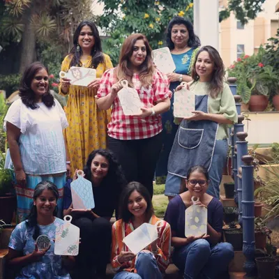 A perfect idea for a ladies' day out or a special celebration. This happy group spent the afternoon painting their own ceramic cheese platters, sharing stories and a bit of wine.