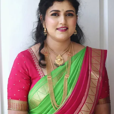 Mrs. Shreegowri looking elegant for an engagement ceremony. I gave her a soft party makeup look with gentle waves in her hair, perfect for a family celebration.